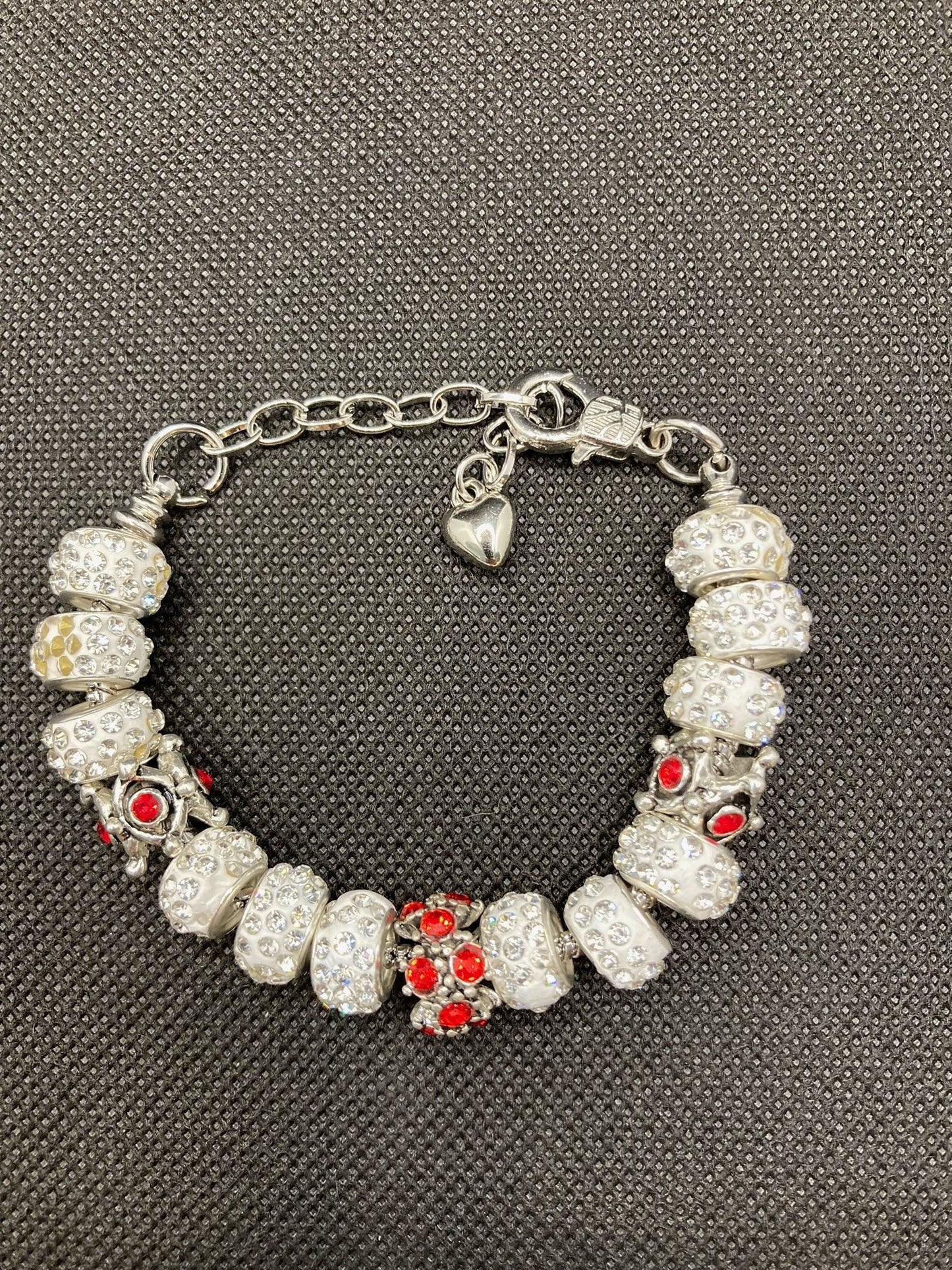 Bling Bracelet with White Clay with Rhinestones and Custom Metal Beads with Red Rhinestones.