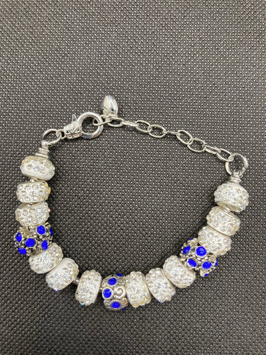 Bling Bracelet with White Clay with Rhinestones and Custom Metal Beads with Blue Rhinestones.